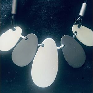 Worn once-Stainless steel polish necklace from France